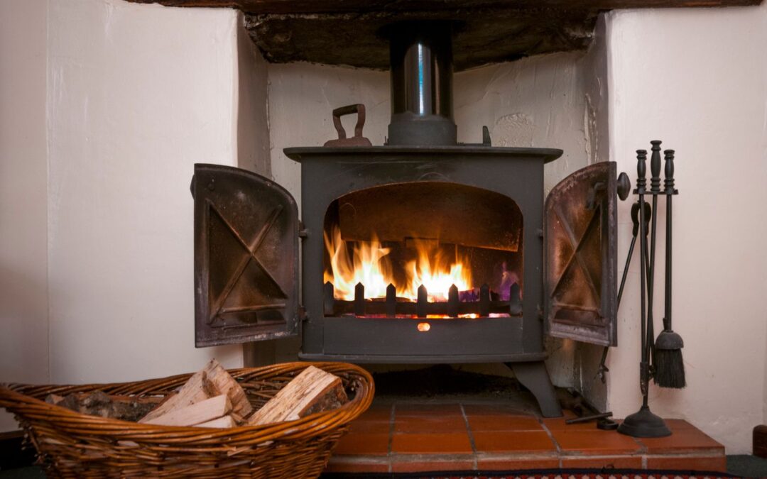 wood burning stove built in existing fireplace